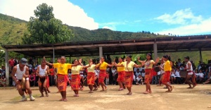 Locals from Loccong dancing a cultural dance.